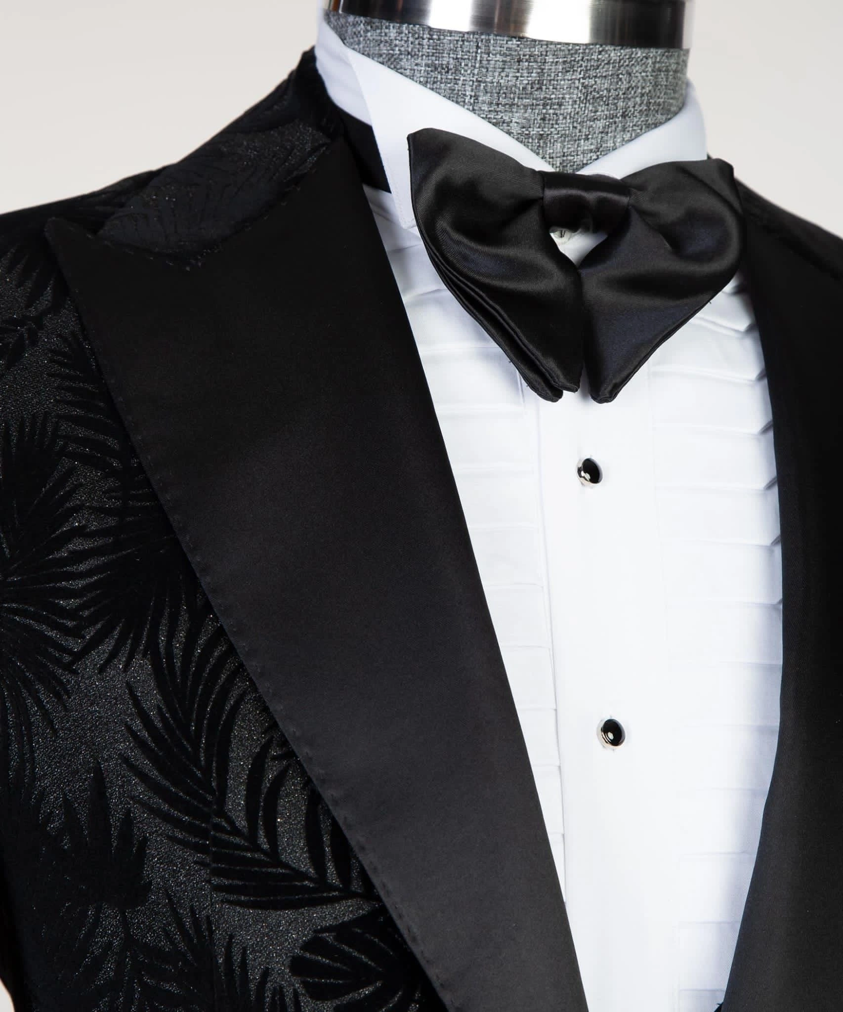Sort elegance: 3 sorte smokingjakker – klar til fest eller formelle begivenheder.